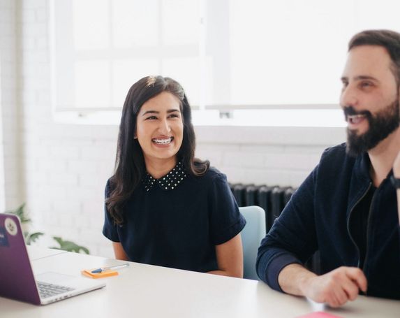 man woman laptop office