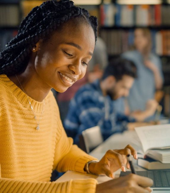 Student in library edit