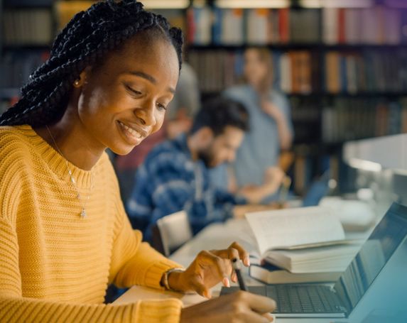 Student in library edit