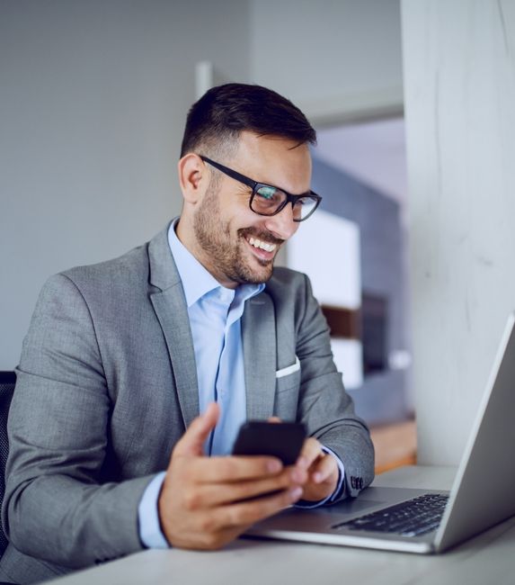 man smart suit glasses laptop