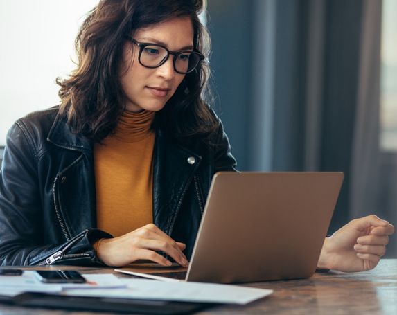 woman casual glasses laptop