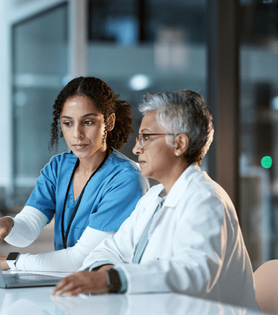 nurse and doctor on laptop