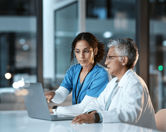 nurse and doctor on laptop