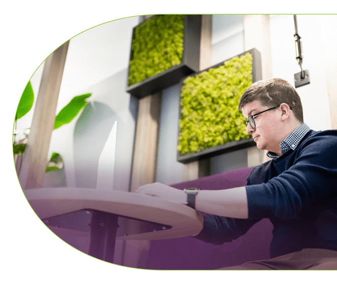 Treated working at desk foreground